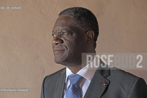 Ferrara October 4, 2014..Denis Mukwege, photographed in Ferrara, is a congolese gynecologist physician who treats women raped and AIDS. Work 18 hours a day in the center that he founded. He was awarded by the Swedish Parliament the Right livelihood considered the alternative Nobel. is nominated for the Nobel Peace Prize/Denis Mukwege, fotografato a Ferrara, è un medico ginecologo congolese che cura le donne stuprate e malate di AIDS. Opera 18 ore al giorno nellcentro che ha fondato. Gli è stato assegnato dal Parlamento svedese il Right livelihood considerato il Nobel alternativo; è candidato al Premio Nobel per la Pace..Photo: RINO BIANCHI ©Rino Bianchi/Rosebud2