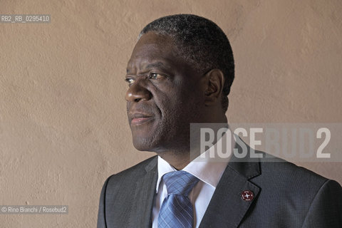 Ferrara October 4, 2014..Denis Mukwege, photographed in Ferrara, is a congolese gynecologist physician who treats women raped and AIDS. Work 18 hours a day in the center that he founded. He was awarded by the Swedish Parliament the Right livelihood considered the alternative Nobel. is nominated for the Nobel Peace Prize/Denis Mukwege, fotografato a Ferrara, è un medico ginecologo congolese che cura le donne stuprate e malate di AIDS. Opera 18 ore al giorno nellcentro che ha fondato. Gli è stato assegnato dal Parlamento svedese il Right livelihood considerato il Nobel alternativo; è candidato al Premio Nobel per la Pace..Photo: RINO BIANCHI ©Rino Bianchi/Rosebud2