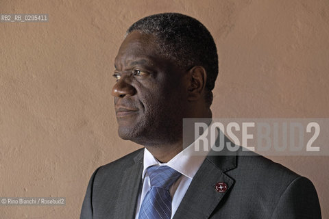 Ferrara October 4, 2014..Denis Mukwege, photographed in Ferrara, is a congolese gynecologist physician who treats women raped and AIDS. Work 18 hours a day in the center that he founded. He was awarded by the Swedish Parliament the Right livelihood considered the alternative Nobel. is nominated for the Nobel Peace Prize/Denis Mukwege, fotografato a Ferrara, è un medico ginecologo congolese che cura le donne stuprate e malate di AIDS. Opera 18 ore al giorno nellcentro che ha fondato. Gli è stato assegnato dal Parlamento svedese il Right livelihood considerato il Nobel alternativo; è candidato al Premio Nobel per la Pace..Photo: RINO BIANCHI ©Rino Bianchi/Rosebud2