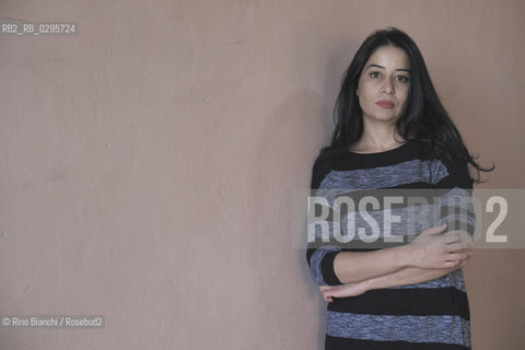 Ferrara October 3, 2014..Maisa Saleh, photographed in Ferrara, Syrian journalist, worked as a correspondent for Orient news television, following the civil war in Syria from Damascus. Hiding his identity, he conducted a weekly program of interviews with revolutionaries, dealing with the non-violent resistance of the civilian population. In 2013 was arrested and held for seven months by the Government of Bashar al-Assad/Maisa Saleh, fotografata a Ferrara, giornalista siriana, ha lavorato come corrispondente per la Orient news television, seguendo la guerra civile in Siria da Damasco. Nascondendo la sua identità, ha condotto un programma settimanale di interviste ai rivoluzionari, occupandosi anche della resistenza non violenta della popolazione civile. Nel 2013 è stata arrestata e trattenuta per sette mesi dal governo di Bashar al Assad..Photo: RINO BIANCHI ©Rino Bianchi/Rosebud2