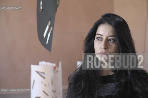Ferrara October 3, 2014..Maisa Saleh, photographed in Ferrara, Syrian journalist, worked as a correspondent for Orient news television, following the civil war in Syria from Damascus. Hiding his identity, he conducted a weekly program of interviews with revolutionaries, dealing with the non-violent resistance of the civilian population. In 2013 was arrested and held for seven months by the Government of Bashar al-Assad/Maisa Saleh, fotografata a Ferrara, giornalista siriana, ha lavorato come corrispondente per la Orient news television, seguendo la guerra civile in Siria da Damasco. Nascondendo la sua identità, ha condotto un programma settimanale di interviste ai rivoluzionari, occupandosi anche della resistenza non violenta della popolazione civile. Nel 2013 è stata arrestata e trattenuta per sette mesi dal governo di Bashar al Assad..Photo: RINO BIANCHI ©Rino Bianchi/Rosebud2