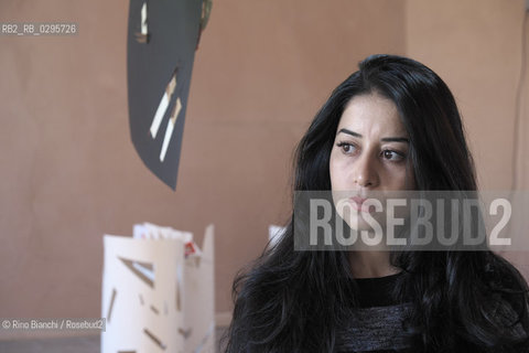 Ferrara October 3, 2014..Maisa Saleh, photographed in Ferrara, Syrian journalist, worked as a correspondent for Orient news television, following the civil war in Syria from Damascus. Hiding his identity, he conducted a weekly program of interviews with revolutionaries, dealing with the non-violent resistance of the civilian population. In 2013 was arrested and held for seven months by the Government of Bashar al-Assad/Maisa Saleh, fotografata a Ferrara, giornalista siriana, ha lavorato come corrispondente per la Orient news television, seguendo la guerra civile in Siria da Damasco. Nascondendo la sua identità, ha condotto un programma settimanale di interviste ai rivoluzionari, occupandosi anche della resistenza non violenta della popolazione civile. Nel 2013 è stata arrestata e trattenuta per sette mesi dal governo di Bashar al Assad..Photo: RINO BIANCHI ©Rino Bianchi/Rosebud2