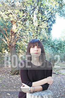 Rome, December 12 2014..Nadia Terranova, photographed in Rome, writer. Publishes stories for both large and small stories for several publishers and his books have won awards including the Premio Napoli, the Prize Laura Orvieto, the Prize Mariele Ventre, but considering rewarded each time a child goes to her and points out something about a book/Nadia Terranova, fotografata a Roma, scrittrice. Pubblica sia storie per grandi che storie per piccoli per diversi editori e i suoi libri hanno ottenuto riconoscimenti tra cui il Premio Napoli, il Premio Laura Orvieto, il premio Mariele Ventre, ma si considera premiata ogni volta che un bambino va da lei e le fa notare qualcosa su un suo libro..Photo: RINO BIANCHI ©Rino Bianchi/Rosebud2