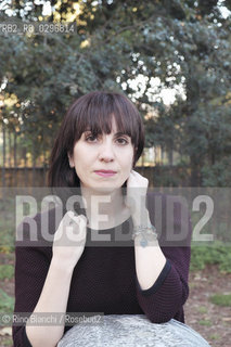 Rome, December 12 2014..Nadia Terranova, photographed in Rome, writer. Publishes stories for both large and small stories for several publishers and his books have won awards including the Premio Napoli, the Prize Laura Orvieto, the Prize Mariele Ventre, but considering rewarded each time a child goes to her and points out something about a book/Nadia Terranova, fotografata a Roma, scrittrice. Pubblica sia storie per grandi che storie per piccoli per diversi editori e i suoi libri hanno ottenuto riconoscimenti tra cui il Premio Napoli, il Premio Laura Orvieto, il premio Mariele Ventre, ma si considera premiata ogni volta che un bambino va da lei e le fa notare qualcosa su un suo libro..Photo: RINO BIANCHI ©Rino Bianchi/Rosebud2
