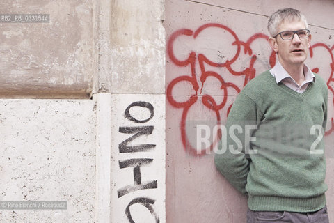 Rome February 21 2015..John Foot, historian and essayist, professor of contemporary history at the Department of Italian at the University of Bristol, photographed in Rome in the popular district of Pigneto/John Foot, storico e saggista, docente di storia contemporanea al dipartimento di italiano dellUniversity of Bristol, fotografato a Roma nel popolare quartiere del Pigneto..Photo: RINO BIANCHI ©Rino Bianchi/Rosebud2