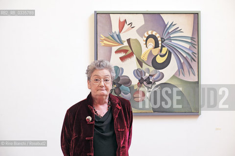 Rome May 25, 2015..Clara Sereni, writer, journalist and translator is the daughter of Emilio Sereni and Xenia Silberberg, photographed in Rome at the House of Literature in front of a painting by Depero/Clara Sereni,  scrittrice, giornalista e traduttrice è figlia di Emilio Sereni e di Xenia Silberberg, fotografata a Roma alla Casa delle Letterature davanti ad un dipinto di Depero..Photo: RINO BIANCHI ©Rino Bianchi/Rosebud2