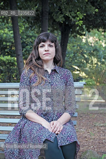 Rome May 25, 2015..Isabella Pedicini, historian, scholar of photography, blogger and writer, photographed in Rome in the park of Villa Celimontana. For the publishing house Contrasto published an essay titled Francesca Woodman. The Roman years between skin and film and for eitore Fazi Recipes humoral/Isabella Pedicini,  storica dellarte, studiosa della fotografia, blogger e scrittrice, fotografata a Roma nel parco di Villa Celimontana. Per la casa editrice Contrasto ha pubblicato un saggio dal titolo Francesca Woodman. Gli anni romani tra pelle e pellicola e per leitore Fazi Ricette umorali. .Photo: RINO BIANCHI ©Rino Bianchi/Rosebud2