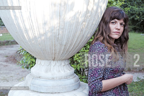 Rome May 25, 2015..Isabella Pedicini, historian, scholar of photography, blogger and writer, photographed in Rome in the park of Villa Celimontana. For the publishing house Contrasto published an essay titled Francesca Woodman. The Roman years between skin and film and for eitore Fazi Recipes humoral/Isabella Pedicini,  storica dellarte, studiosa della fotografia, blogger e scrittrice, fotografata a Roma nel parco di Villa Celimontana. Per la casa editrice Contrasto ha pubblicato un saggio dal titolo Francesca Woodman. Gli anni romani tra pelle e pellicola e per leitore Fazi Ricette umorali. .Photo: RINO BIANCHI ©Rino Bianchi/Rosebud2