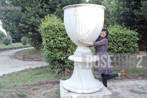 Rome May 25, 2015..Isabella Pedicini, historian, scholar of photography, blogger and writer, photographed in Rome in the park of Villa Celimontana. For the publishing house Contrasto published an essay titled Francesca Woodman. The Roman years between skin and film and for eitore Fazi Recipes humoral/Isabella Pedicini,  storica dellarte, studiosa della fotografia, blogger e scrittrice, fotografata a Roma nel parco di Villa Celimontana. Per la casa editrice Contrasto ha pubblicato un saggio dal titolo Francesca Woodman. Gli anni romani tra pelle e pellicola e per leitore Fazi Ricette umorali. .Photo: RINO BIANCHI ©Rino Bianchi/Rosebud2