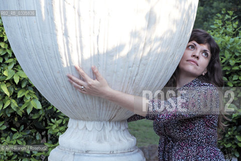 Rome May 25, 2015..Isabella Pedicini, historian, scholar of photography, blogger and writer, photographed in Rome in the park of Villa Celimontana. For the publishing house Contrasto published an essay titled Francesca Woodman. The Roman years between skin and film and for eitore Fazi Recipes humoral/Isabella Pedicini,  storica dellarte, studiosa della fotografia, blogger e scrittrice, fotografata a Roma nel parco di Villa Celimontana. Per la casa editrice Contrasto ha pubblicato un saggio dal titolo Francesca Woodman. Gli anni romani tra pelle e pellicola e per leitore Fazi Ricette umorali. .Photo: RINO BIANCHI ©Rino Bianchi/Rosebud2