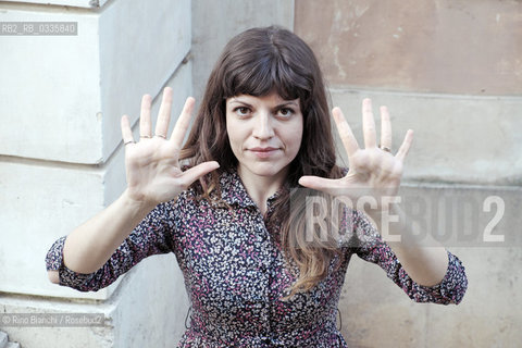 Rome May 25, 2015..Isabella Pedicini, historian, scholar of photography, blogger and writer, photographed in Rome in the park of Villa Celimontana. For the publishing house Contrasto published an essay titled Francesca Woodman. The Roman years between skin and film and for eitore Fazi Recipes humoral/Isabella Pedicini,  storica dellarte, studiosa della fotografia, blogger e scrittrice, fotografata a Roma nel parco di Villa Celimontana. Per la casa editrice Contrasto ha pubblicato un saggio dal titolo Francesca Woodman. Gli anni romani tra pelle e pellicola e per leitore Fazi Ricette umorali. .Photo: RINO BIANCHI ©Rino Bianchi/Rosebud2