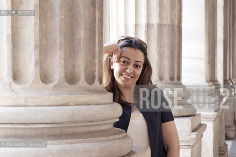 Rome June 10, 2015..Suha Oda, photographed in Rome in Piazza Colonna, reporter, journalist and human rights activist who fled from Mosul, occupied by the IS/Suha Oda, fotografata a Roma in piazza Colonna, reporter, giornalista e attivista per i diritti umani fuggita da Mosul, occupata dallIS..Photo: RINO BIANCHI ©Rino Bianchi/Rosebud2