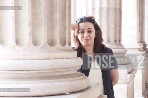 Rome June 10, 2015..Suha Oda, photographed in Rome in Piazza Colonna, reporter, journalist and human rights activist who fled from Mosul, occupied by the IS/Suha Oda, fotografata a Roma in piazza Colonna, reporter, giornalista e attivista per i diritti umani fuggita da Mosul, occupata dallIS..Photo: RINO BIANCHI ©Rino Bianchi/Rosebud2