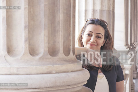 Rome June 10, 2015..Suha Oda, photographed in Rome in Piazza Colonna, reporter, journalist and human rights activist who fled from Mosul, occupied by the IS/Suha Oda, fotografata a Roma in piazza Colonna, reporter, giornalista e attivista per i diritti umani fuggita da Mosul, occupata dallIS..Photo: RINO BIANCHI ©Rino Bianchi/Rosebud2