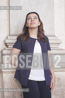 Rome June 10, 2015..Suha Oda, photographed in Rome in Piazza Colonna, reporter, journalist and human rights activist who fled from Mosul, occupied by the IS/Suha Oda, fotografata a Roma in piazza Colonna, reporter, giornalista e attivista per i diritti umani fuggita da Mosul, occupata dallIS..Photo: RINO BIANCHI ©Rino Bianchi/Rosebud2