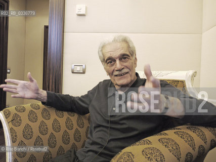 Rome 24 November 2011..Omar Sharif, photographed in Rome on the terrace of the Hotel Boscolo, actor, born in Alexandria, Egypt, the son of Lebanese immigrants greek-orthodox originating in Zahle. Omar Sharif graduated from Victoria College in Alexandria degree in mathematics and physics at the University of Cairo. He worked with his father in the timber trade. The career of the actor began in 1953 and his first English language film was Lawrence of Arabia in 1962/Omar Sharif, fotografato a Roma sulla terrazza del Boscolo Hotel, attore, nato ad Alessandria dEgitto, figlio di immigrati libanesi greco-ortodossi originari di Zahle. Omar Sharif  diplomato al Victoria College di Alessandria laureato in matematica e fisica alluniversità del Cairo. Ha lavorato con suo padre nel commercio del legname. La carriera di attore la inizia nel 1953 e suo primo film in inglese fu Lawrence dArabia del 1962..Photo:: RINO BIANCHI ©Rino Bianchi/Rosebud2