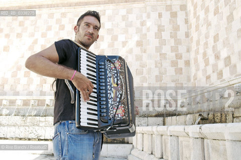 LAquila September 6, 2015..Il jazz italiano per LAquila..Carmine Ioanna, pianist and accordionist, born in Nusco, photographed the Fontana delle 99 cannelle./Carmine Ioanna, pianista e fisarmonicista, originario di Nusco, fotografato alla Fontana delle 99 cannelle..Photo: RINO BIANCHI ©Rino Bianchi/Rosebud2