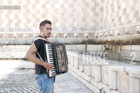 LAquila September 6, 2015..Il jazz italiano per LAquila..Carmine Ioanna, pianist and accordionist, born in Nusco, photographed the Fontana delle 99 cannelle./Carmine Ioanna, pianista e fisarmonicista, originario di Nusco, fotografato alla Fontana delle 99 cannelle..Photo: RINO BIANCHI ©Rino Bianchi/Rosebud2