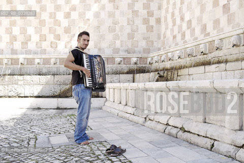 LAquila September 6, 2015..Il jazz italiano per LAquila..Carmine Ioanna, pianist and accordionist, born in Nusco, photographed the Fontana delle 99 cannelle./Carmine Ioanna, pianista e fisarmonicista, originario di Nusco, fotografato alla Fontana delle 99 cannelle..Photo: RINO BIANCHI ©Rino Bianchi/Rosebud2