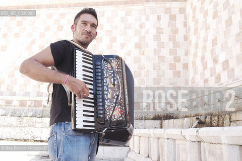 LAquila September 6, 2015..Il jazz italiano per LAquila..Carmine Ioanna, pianist and accordionist, born in Nusco, photographed the Fontana delle 99 cannelle./Carmine Ioanna, pianista e fisarmonicista, originario di Nusco, fotografato alla Fontana delle 99 cannelle..Photo: RINO BIANCHI ©Rino Bianchi/Rosebud2