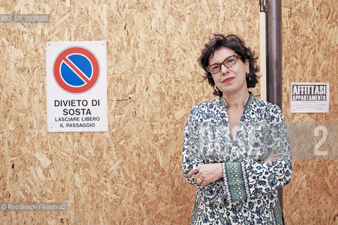 LAquila September 6, 2015..Il jazz italiano per LAquila..Ada Montellanico, singer, photographed in LAquila in front of the entrance to a construction site in the Piazza Gesuiti/Ada Montellanico, cantante, fotografata a LAquila davanti lingresso di un cantiere in Piazza Gesuiti..Photo: RINO BIANCHI ©Rino Bianchi/Rosebud2