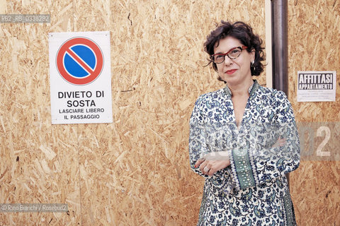 LAquila September 6, 2015..Il jazz italiano per LAquila..Ada Montellanico, singer, photographed in LAquila in front of the entrance to a construction site in the Piazza Gesuiti/Ada Montellanico, cantante, fotografata a LAquila davanti lingresso di un cantiere in Piazza Gesuiti..Photo: RINO BIANCHI ©Rino Bianchi/Rosebud2