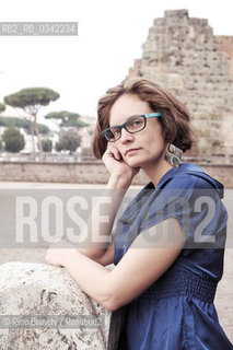 Rome December 6, 2015..Merritt Tierce, Texan writer photographed in Rome, was awarded the National Book Foundation as one of the five best American writers under thirty-five. It is an activist involved in the defense of womens rights, particularly abortion/Merritt Tierce, scrittrice texana fotografata a Roma, è stata premiata dalla National Book Foundation come uno dei cinque migliori scrittori americani sotto i trentacinque anni. È un’attivista impegnata nella difesa dei diritti delle donne, in particolare quello all’aborto..Photo: RINO BIANCHI ©Rino Bianchi/Rosebud2