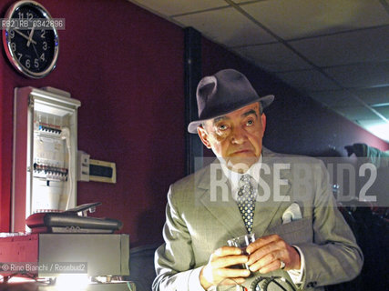 Rome June 3, 2010..Felix Picherna, photographed in Rome in a milonga in Torpignattara, and muzicalizador, disk jockey of the milonga. In Italy was the master of all and is due above all when it comes to muzicalizador-disc jockey. Globetrotter with the trolley, where they remain piled up the old cassette rewinding with two fingers/Felix Picherna, fotografato a Roma in una milonga a Torpignattara, el muzicalizador, disk jokey della milonga. In Italia é stato il maestro di tutti e gli é dovuta ogni precedenza quando si parla di muzicalizador-disc jockey. Giramondo con il trolley, dove restano ammucchiate le antiche cassette che riavvolge con due dita. .Photo: RINO BIANCHI ©Rino Bianchi/Rosebud2