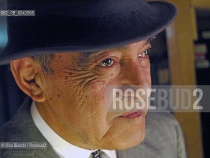 Rome June 3, 2010..Felix Picherna, photographed in Rome in a milonga in Torpignattara, and muzicalizador, disk jockey of the milonga. In Italy was the master of all and is due above all when it comes to muzicalizador-disc jockey. Globetrotter with the trolley, where they remain piled up the old cassette rewinding with two fingers/Felix Picherna, fotografato a Roma in una milonga a Torpignattara, el muzicalizador, disk jokey della milonga. In Italia é stato il maestro di tutti e gli é dovuta ogni precedenza quando si parla di muzicalizador-disc jockey. Giramondo con il trolley, dove restano ammucchiate le antiche cassette che riavvolge con due dita. .Photo: RINO BIANCHI ©Rino Bianchi/Rosebud2