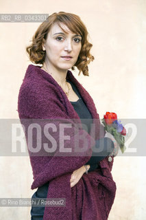 Rome February 5, 2016..Isabella Leardini, photographed in Rome in Piazza di Pietra, poet, in 2002 won the Montale Prize with the poems La coinquiina scalza. Poems from La coinquilina scalza and his next book Una stagione daria are published with translation of Jean Baptiste Para anthology Les Poètes de la Méditerranée (Gallimard 2010) and is included in the anthology Nuovi poeti italiani 6 (Einaudi 2012). Care as artistic director the festival Parco Poesia/Isabella Leardini, fotografata a Roma in Piazza di Pietra, poetessa, nel 2002 ha vinto il Premio Montale con le poesie “La coinquilina scalza”. Poesie da “La coinquilina scalza” e dal suo prossimo libro “Una stagione daria” sono edite con traduzione di Jean Baptiste Para nellantologia “Les Poètes de la Méditerranée” (Gallimard 2010) ed è compresa nellantologia “Nuovi Poeti Italiani 6” (Einaudi 2012). Cura come direttore artistico il festival Parco Poesia..Photo: RINO BIANCHI ©Rino Bianchi/Rosebud2