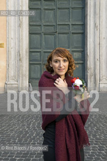 Rome February 5, 2016..Isabella Leardini, photographed in Rome in Piazza di Pietra, poet, in 2002 won the Montale Prize with the poems La coinquiina scalza. Poems from La coinquilina scalza and his next book Una stagione daria are published with translation of Jean Baptiste Para anthology Les Poètes de la Méditerranée (Gallimard 2010) and is included in the anthology Nuovi poeti italiani 6 (Einaudi 2012). Care as artistic director the festival Parco Poesia/Isabella Leardini, fotografata a Roma in Piazza di Pietra, poetessa, nel 2002 ha vinto il Premio Montale con le poesie “La coinquilina scalza”. Poesie da “La coinquilina scalza” e dal suo prossimo libro “Una stagione daria” sono edite con traduzione di Jean Baptiste Para nellantologia “Les Poètes de la Méditerranée” (Gallimard 2010) ed è compresa nellantologia “Nuovi Poeti Italiani 6” (Einaudi 2012). Cura come direttore artistico il festival Parco Poesia..Photo: RINO BIANCHI ©Rino Bianchi/Rosebud2