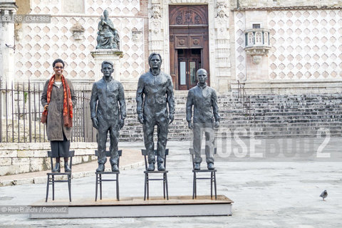 Perugia april 10, 2016..Igiaba Scego, writer and reporter, photographed in Perugia between Edward Snowden, Julian Assange and Chelsea Manning, three contemporary heroes that make up Anything to say? the monument built by David Dormino/Igiaba Scego, scrittrice e giornalista, fotografata a Perugia tra Edward Snowden, Julian Assange e Chelsea Manning, tre eroi contemporanei che compongono Anything to say? il monumento realizzato da Davide Dormino..Photo: RINO BIANCHI ©Rino Bianchi/Rosebud2