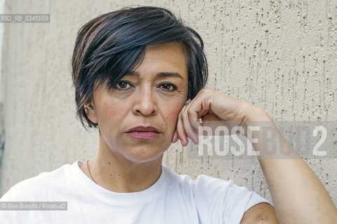 Rome May 20, 2016..Anabel Hernández, photographed in Rome in the Pigneto quarter, internationally recognized as one of the best investigative journalists in Mexico, specializing in corruption and drug trafficking, working as a freelancer for Reforma and the magazine Proceso. In 2012 she was awarded the Golden Pen of Freedom and the organization Reporters Without Borders has included it in the top 100 heroes of information in the worldAnabel Hernández, fotografata a Roma nel quartiere del Pigneto,  riconosciuta a livello internazionale come una delle migliori giornaliste investigative del Messico, specializzata in corruzione e narcotraffico, collabora come freelance per «Reforma» e per la rivista «Proceso». Nel 2012 le è stato assegnato il Golden Pen of Freedom e lorganizzazione Reporters sans frontières lha inserita nella top 100 degli eroi dellinformazione nel mondo..Photo: RINO BIANCHI ©Rino Bianchi/Rosebud2