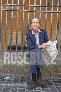 Rome June 22, 2016..Enzo Cucchi artist, painter and sculptor, a leading figure of the Italian Transvanguard photographed in Rome in Piazza San Lorenzo in Lucina/Enzo Cucchi artista, pittore e scultore,  esponenente di spicco della Transavanguardia italiana, fotografato a Roma in piazza S.Lorenzo in Lucina..Photo: RINO BIANCHI ©Rino Bianchi/Rosebud2