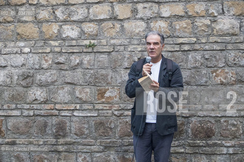 Rome July 25, 2016..Edoardo Albinati photographed on the occasion of reading organized by the Piccoli Maestri in support of Baobab experience/Edoardo Albinati fotografato in occasione della lettura organizzata dallAssociazione Piccoli Maestri a sostegno di Baobab experience..Photo: RINO BIANCHI ©Rino Bianchi/Rosebud2