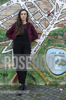 Rome December 15, 2016..Giulia Caminito, photographed in the Roman district of Testaccio, Italian writer, works for a Roman publishing house/Giulia Caminito, fotografata nel quartiere romano di Testaccio, scrittrice italiana, lavora per una casa editrice romana. .Photo: RINO BIANCHI ©Rino Bianchi/Rosebud2