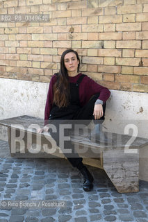 Rome December 15, 2016..Giulia Caminito, photographed in the Roman district of Testaccio, Italian writer, works for a Roman publishing house/Giulia Caminito, fotografata nel quartiere romano di Testaccio, scrittrice italiana, lavora per una casa editrice romana. .Photo: RINO BIANCHI ©Rino Bianchi/Rosebud2