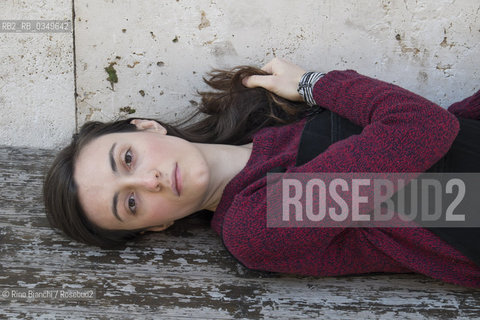 Rome December 15, 2016..Giulia Caminito, photographed in the Roman district of Testaccio, Italian writer, works for a Roman publishing house/Giulia Caminito, fotografata nel quartiere romano di Testaccio, scrittrice italiana, lavora per una casa editrice romana. .Photo: RINO BIANCHI ©Rino Bianchi/Rosebud2