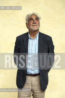 Turin June 8, 2018..Riccardo Barenghi, Italian journalist and essayist, known under the pseudonym of Jena, former editor of Il Manifesto and callaboratore de La Stampa, photographed in Turin in the courtyard of the Circolo dei Lettori/Riccardo Barenghi, giornalista italiano e saggista, conosciuto con lo pseudonimo di Jena, ex direttore de Il Manifesto e callaboratore de La Stampa, fotografato a Torino nel cortile del Circolo dei Lettori. ©Rino Bianchi/Rosebud2