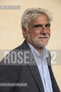 Turin June 8, 2018..Riccardo Barenghi, Italian journalist and essayist, known under the pseudonym of Jena, former editor of Il Manifesto and callaboratore de La Stampa, photographed in Turin in the courtyard of the Circolo dei Lettori/Riccardo Barenghi, giornalista italiano e saggista, conosciuto con lo pseudonimo di Jena, ex direttore de Il Manifesto e callaboratore de La Stampa, fotografato a Torino nel cortile del Circolo dei Lettori. ©Rino Bianchi/Rosebud2