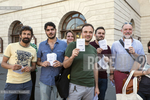 Rome July 4, 2018..Paolo Di Paolo with Simone Nebbia photographed during the flash mob for the Nansen passport promoted by Italian writers and intellectuals to sensitize Italian public opinion on migratory flows and access to travel/Paolo Di Paolo con Simone Nebbia, fotografati durante il flash mob per il passaporto Nansen promosso da scrittori ed intellettuali italiani per sensibilizzare lopinione pubblica italiana sui flussi migratori e laccesso al viaggio.. ©Rino Bianchi/Rosebud2