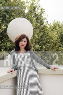 Rome August 2, 2018..Nadia Terranova, writer, author of childrens books and collaborator of newspapers and magazines photographed in Rome on the terrace of Palazzo Merulana/Nadia Terranova, scrittrice, autrice di libri per bambini e collaboratrice di quotidiani e riviste fotografata a Roma sulla terrazza di Palazzo Merulana. ©Rino Bianchi/Rosebud2