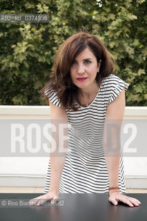 Rome August 2, 2018..Nadia Terranova, writer, author of childrens books and collaborator of newspapers and magazines photographed in Rome on the terrace of Palazzo Merulana/Nadia Terranova, scrittrice, autrice di libri per bambini e collaboratrice di quotidiani e riviste fotografata a Roma sulla terrazza di Palazzo Merulana. ©Rino Bianchi/Rosebud2