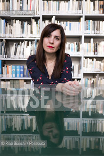 Rome May 20, 2019..Nadia Terranova, writer, collaborator of the newspapers Il del Sole 24 ore, La Repubblica, Internazionale and Il Foglio, photographed in Rome in the Casa delle Letterature spaces in front of the library of the Fondo Enzo Siciliano/Nadia Terranova, scrittrice, collaboratrice delle testate giornalistiche  IL del Sole 24 ore, La Repubblica, Internazionale e il Foglio, fotografata a Roma negli spazi della Casa delle Letterature davanti alla libreria del Fondo Enzo Siciliano. ©Rino Bianchi/Rosebud2