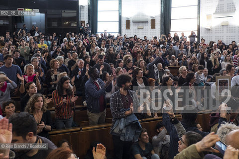 Rome May 13, 2019..Public standing to greet the arrival of the former mayor of Riace Mimmo Lucano in the Aula 1 of La Sapienza University/Pubblico in piedi per salutare larrivo dellex sindaco di Riace Mimmo Lucano allAula 1 dellUniversità La Sapienza. ©Rino Bianchi/Rosebud2