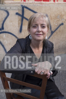 Rome October 12, 2019..Marinella Savino, photographed in the restaurant Dar Parrucca in the Pigneto neighborhood in Rome, author of the novel La sartoria di via Chiatamone with which she was a finalist in the Premio Calvino 2018/Marinella Savino, fotografata nella trattoria Dar Parrucca nel quartiere Pigneto a Roma, autrice del romanzo la La sartoria di via Chiatamone con il quale è stata finalista al Premio Calvino 2018. ©Rino Bianchi/Rosebud2