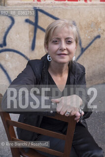 Rome October 12, 2019..Marinella Savino, photographed in the restaurant Dar Parrucca in the Pigneto neighborhood in Rome, author of the novel La sartoria di via Chiatamone with which she was a finalist in the Premio Calvino 2018/Marinella Savino, fotografata nella trattoria Dar Parrucca nel quartiere Pigneto a Roma, autrice del romanzo la La sartoria di via Chiatamone con il quale è stata finalista al Premio Calvino 2018. ©Rino Bianchi/Rosebud2