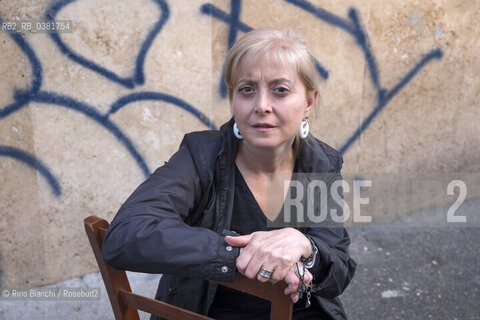 Rome October 12, 2019..Marinella Savino, photographed in the restaurant Dar Parrucca in the Pigneto neighborhood in Rome, author of the novel La sartoria di via Chiatamone with which she was a finalist in the Premio Calvino 2018/Marinella Savino, fotografata nella trattoria Dar Parrucca nel quartiere Pigneto a Roma, autrice del romanzo la La sartoria di via Chiatamone con il quale è stata finalista al Premio Calvino 2018. ©Rino Bianchi/Rosebud2