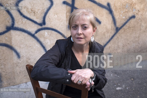 Rome October 12, 2019..Marinella Savino, photographed in the restaurant Dar Parrucca in the Pigneto neighborhood in Rome, author of the novel La sartoria di via Chiatamone with which she was a finalist in the Premio Calvino 2018/Marinella Savino, fotografata nella trattoria Dar Parrucca nel quartiere Pigneto a Roma, autrice del romanzo la La sartoria di via Chiatamone con il quale è stata finalista al Premio Calvino 2018. ©Rino Bianchi/Rosebud2