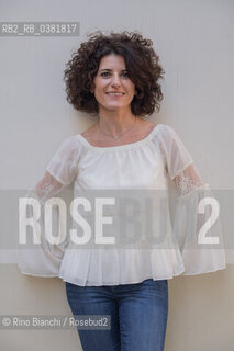 Rome October 13, 2019..Paola Cereda, psychologist and writer, photographed at the Pigneto opposite the Fortebraccio section held for years by Luca Canali/Paola Cereda, psicologa e scrittrice, fotografata al Pigneto di fronte la sezione Fortebraccio retta per anni da Luca Canali. ©Rino Bianchi/Rosebud2